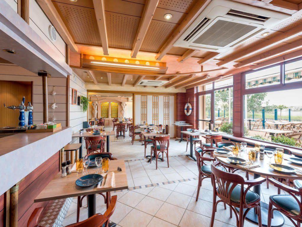 Logis Hotels - Au Poisson D'Argent - Hotel 3 Etoiles Et Restaurant Le Mesnil-en-Vallée Dış mekan fotoğraf